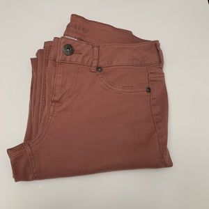 Dusty pink skinny jeans